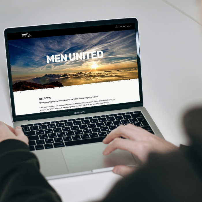 menunited man Working on MacBook Pro Mockup